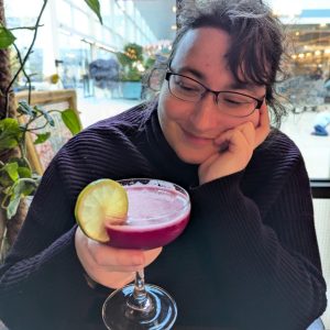 Author Ina Harrington with a dragon fruit cocktail